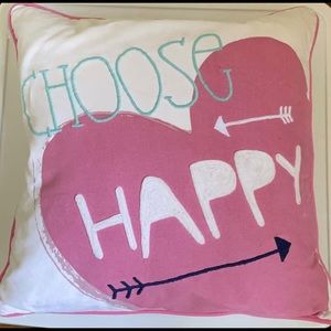 Pillow that says “ Choose Happy”